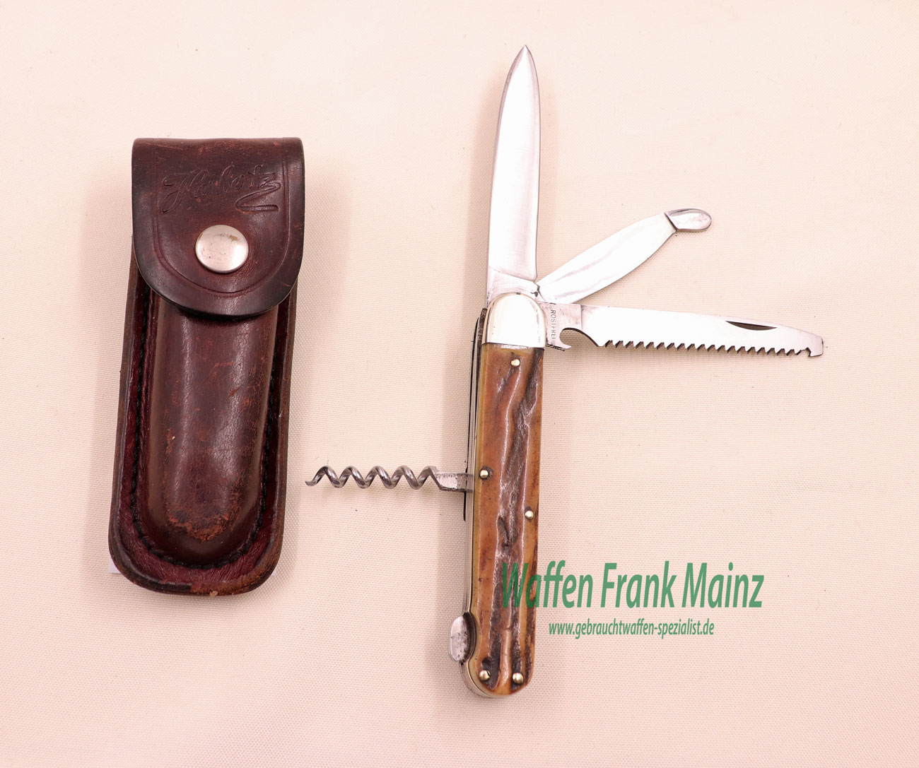 Wingen A., Solingen, Schutzmar Jagd-Klappmesser 4-teilig mit Gürteltasche